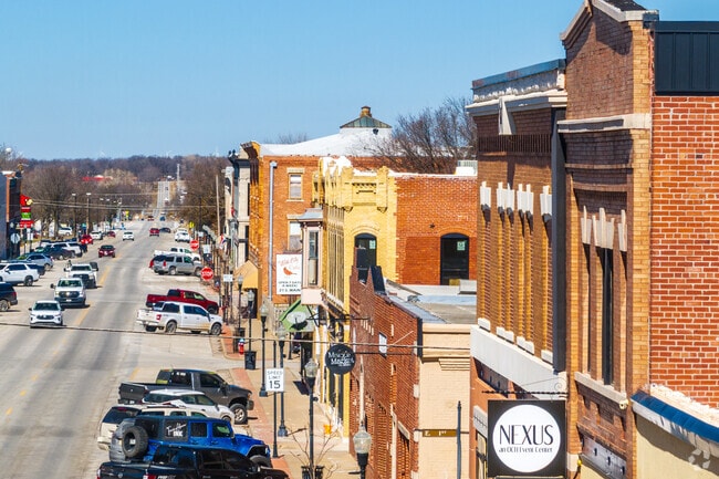 Downtown Webb City is lined with older brick multi story buildings.