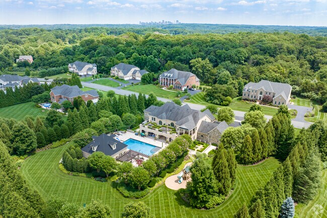 Gorgeous landscaping with lush lawns grace the streets of Tall Oaks/Uplands.