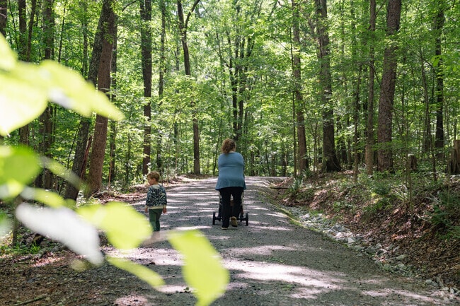 Orchard Knob residents enjoy peaceful strolls through nearby trails at the Lake Charlotte Nature Preserve.
