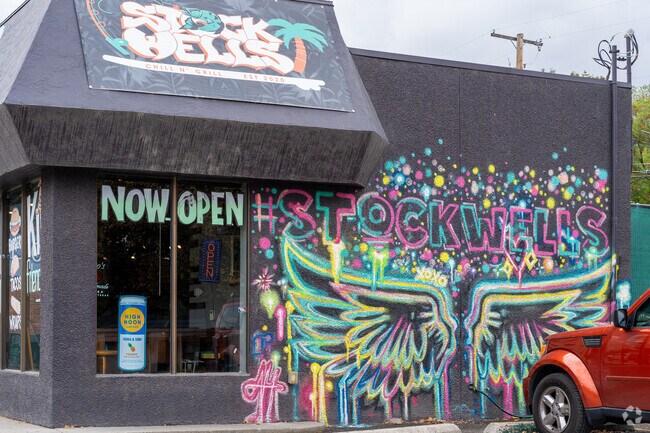 Commercial stores feature large murals in the West Valley neighborhood.