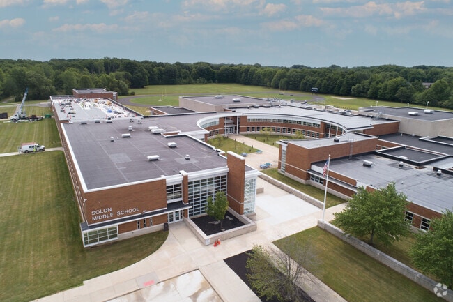 Orchard Middle School has many amenities for students including a football field and track.