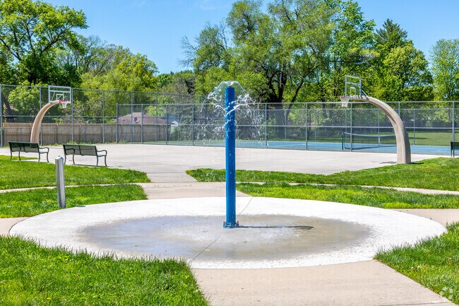 The spryaground of Woodlawn Park is the perfect spot to stay cool in the summer.