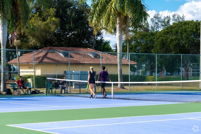 Lakeshore Park residents love a sunny day of tennis.