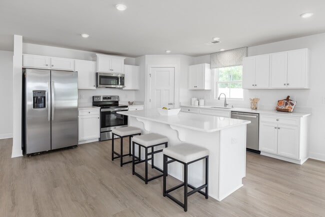 Finally, a kitchen you'll be proud of with a spacious island, granite, stainless appliances & luxury vinyl plank flooring all included up front. Visit today to see it for yourself!
