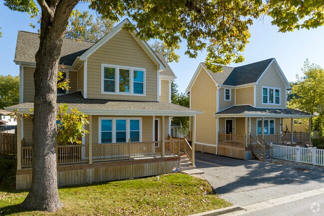 Rows of beach homes sit on the shaded shores of Long Lake Illinois.