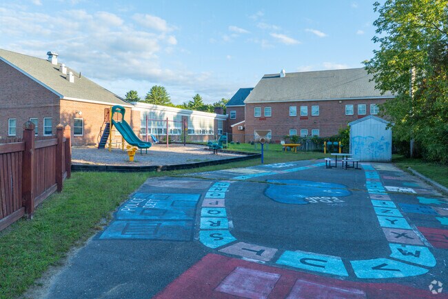 Younger students can enjoy a small schoolyard towards the front of Maple Avenue School.