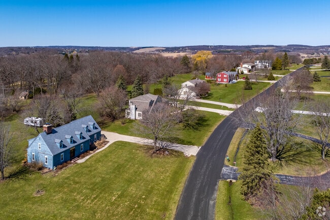 Large homes with acres of land are found on the outskirts of Waukesha.