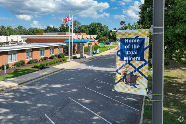 School flag and mascot for J B Watkins Elementary School.