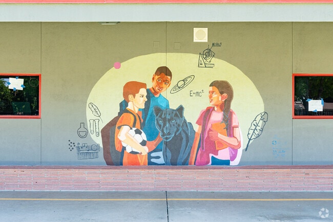 A newly painted mural is featured on a classroom wall at Parkview Middle School in Armona.