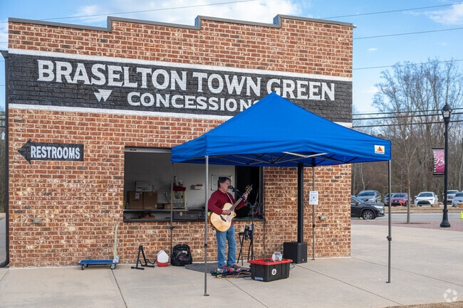 The Braselton Town Green serves as a vibrant hub of community activity, hosting an exciting array of events throughout the year, from lively festivals and outdoor concerts to art shows and seasonal celebrations, making it a cherished gathering place for residents and visitors alike.