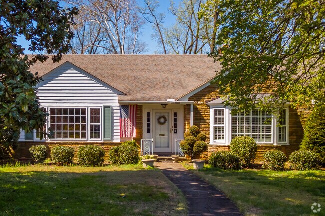 Ranch-style home in South Kensington boasting a large bay window.
