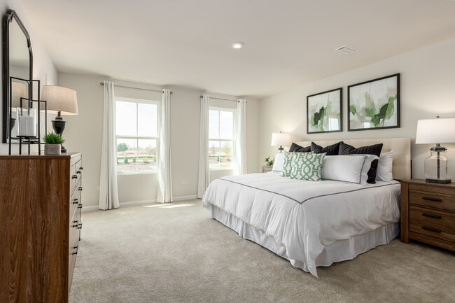 Enjoy your private, spacious owner's suite complete with a walk-in closet and attached bathroom. Join the Interest List to learn more about our included features.