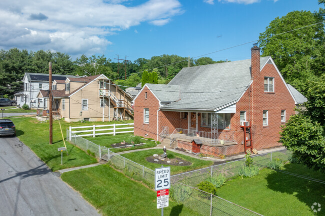 Nicely maintained brick bungalows in Bressler have decent sized yards.