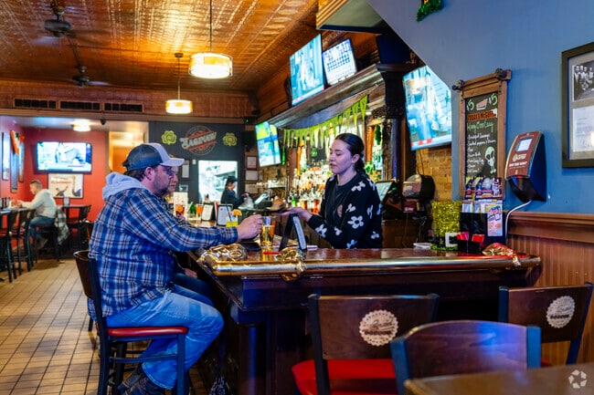 Heritage Square locals head to Liquid Lounge and Kitchen for a great burger during the week.