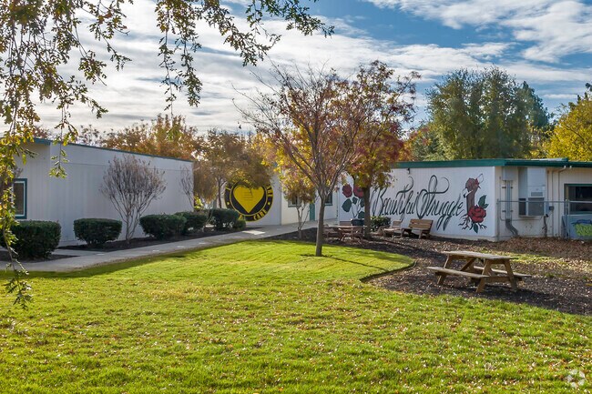 The entrance to Cesar Chavez Community School has a great mural that reads Beautiful Struggle.