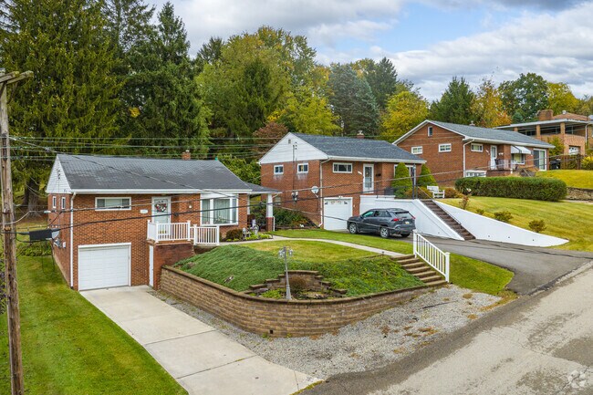Brick Split Level homes in Pulaski Township typically have attached driveways and garages.