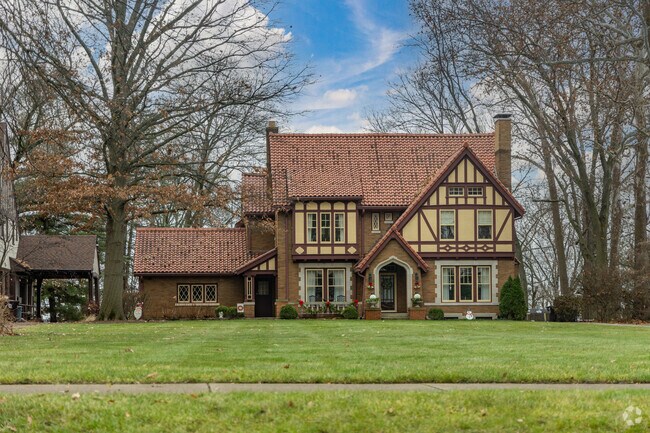 Grad Tutor revival homes are situated on large acreage within West Bluff.