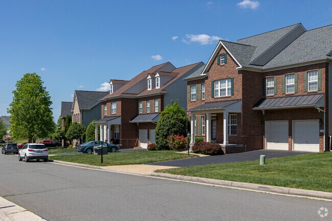 Beautiful brick single-family homes line the streets of Oak Grove.