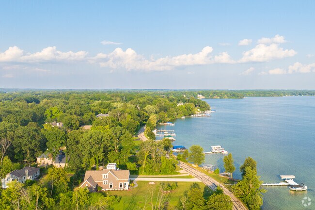 Luxurious waterfront estates on Oconomowoc Lake offer premium living with stunning lake views and exclusive amenities.