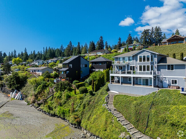 Expensive homes line the shores of Wollechet Bay in Artondale.