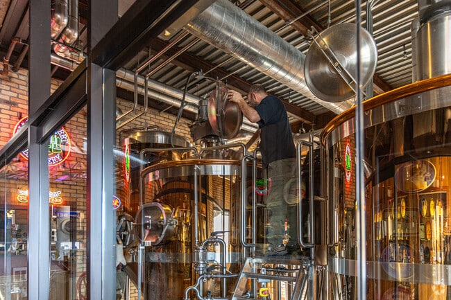 The brewer is hard at work everyday making delicious beer at Water Street Brewery in Oak Creek.