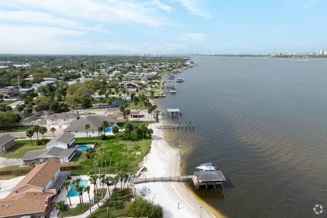 Deep Forest Village is just a few miles away from the Halifax River coast.