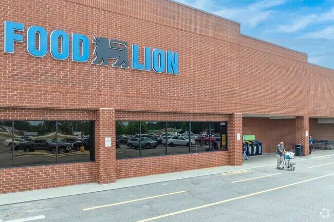 Cross Creek families shop at Food Lion in Goshen Village for weekly grocery needs.