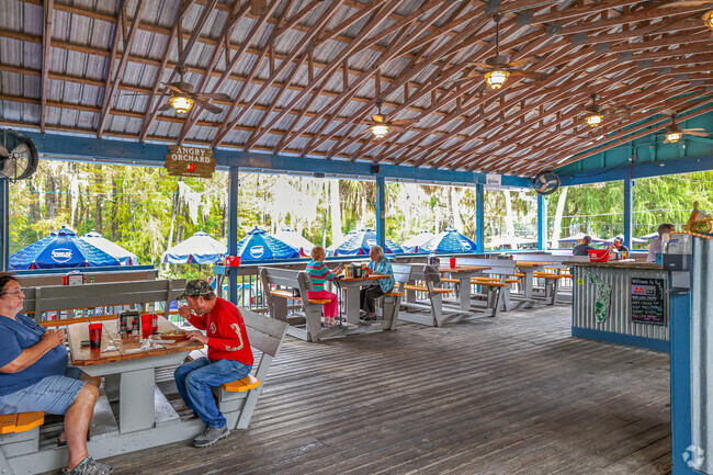 A patio view of bar & grill next to scenic deck in Halpata Tastanki Preserve.