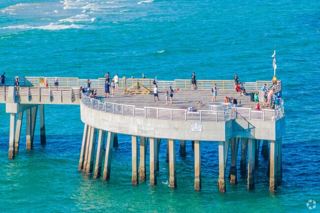People fish and hang out on the pier at Pompano and Santa Barbara Shores.