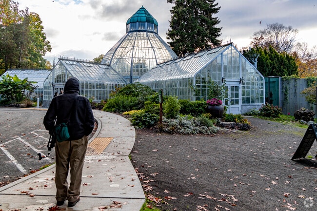 Seymour Conservatory in Wright Park showcases a historic Victorian-style greenhouse.