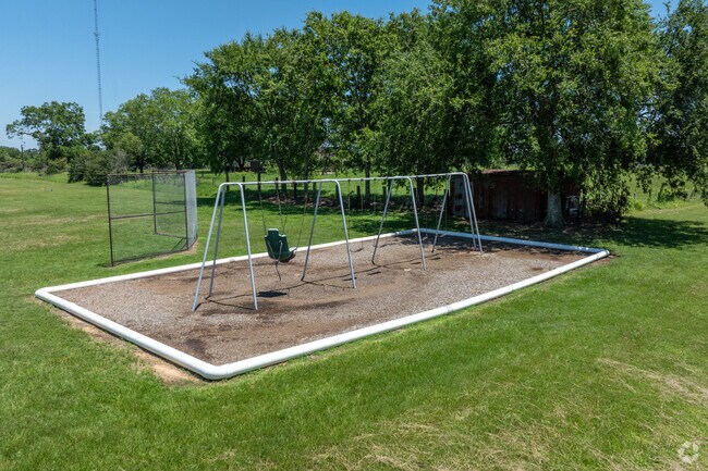Fields Store Elementary's playground includes swings for outdoor fun.