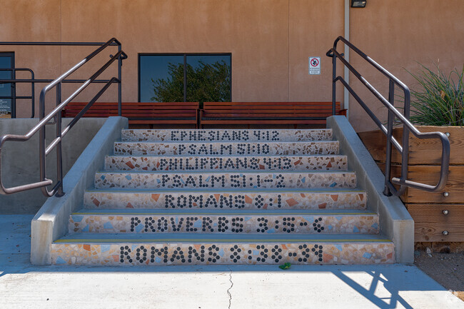 The steps at the rear of the building note popular scriptures at Calvary Christian.