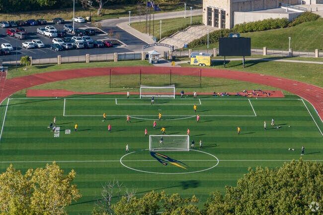 Students enjoy soccer practice at the University of Toledo in Scott Park.