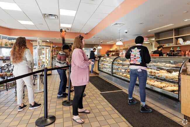 People line up for pastries at LaSalle Bakery in Wanskuck, RI.