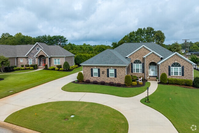 Large newer homes in a variety of styles can be found in Five Forks.