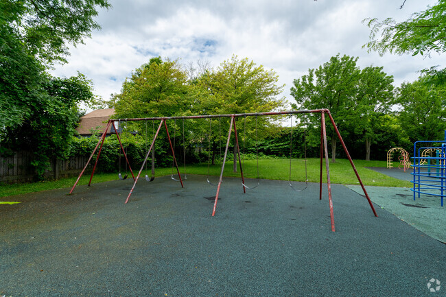 Along with a playground, the RISE Community School has a swingset.