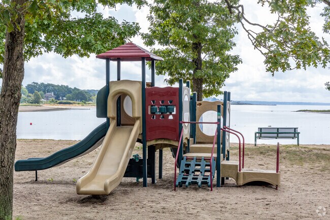 Warwick City Park in the city of Warwick, Rhode Island has multiple playgrounds by the beach.