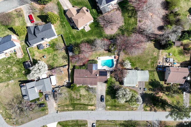 In the Macy Grove neighborhood, you’ll find homes with generous lawns, some even featuring pools.