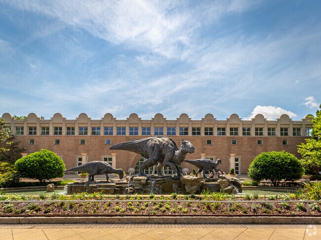 The Fernbank Museum in Druid Hills, GA, welcomes visitors with its iconic entrance and engaging exhibits.