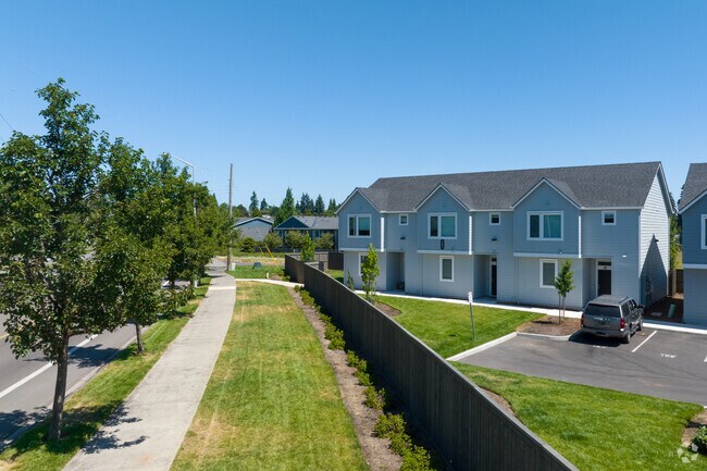 Newly constructed townhomes face NE 18th St in Ogden.