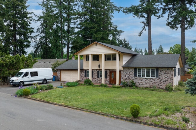 A classical home with large pillars on SE 15th St in Cascade Park.