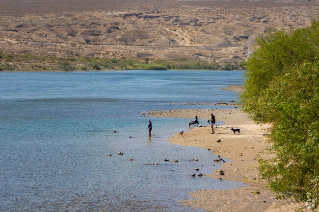 Bullhead City residents love to visit the beaches next to the Colorado River.