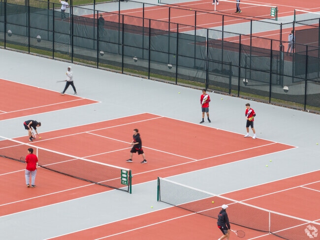 Students enjoying the tennis courts at Connetquot High School.