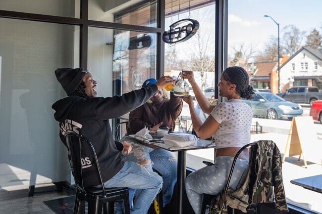 Cheers to brunch at Kuzzo's Chicken and Waffles in Bagley.