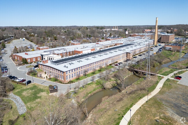 Urban renewal: Revolution Mill Apts redefine Phillips Ave's skyline.
