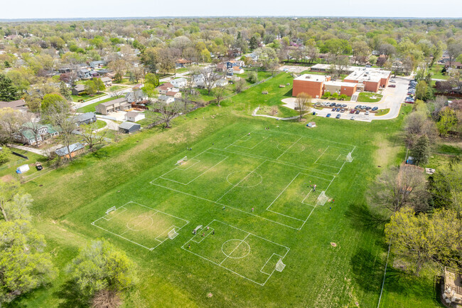Ample green space allows for outdoor learning and PE classes.