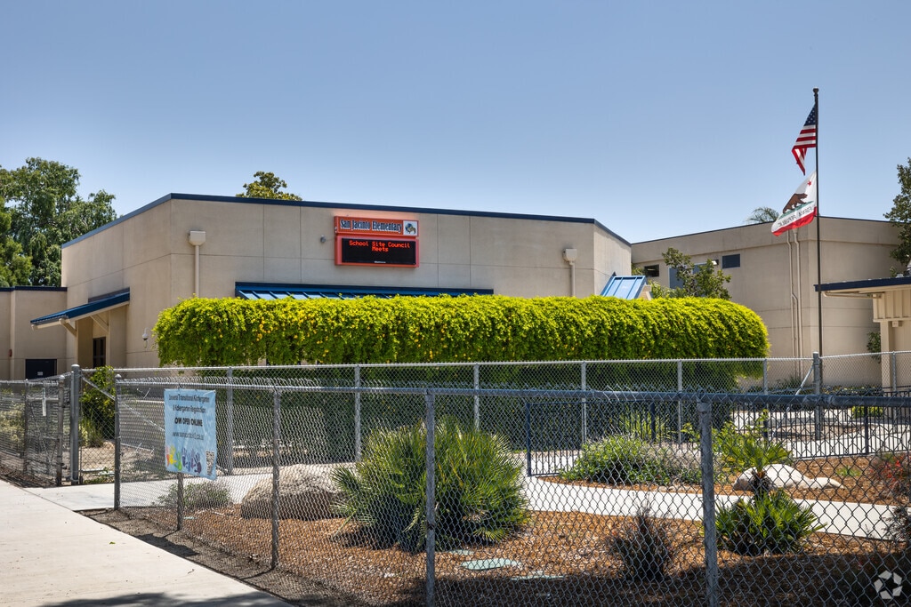 Tall Hedges Cover the Entrance to San Jacinto Elementary School