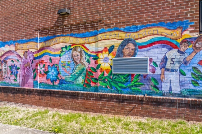 Whitfield Elementary brightens its grounds with vibrant, kid-friendly murals.