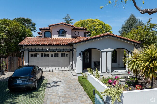 This Adobe Meadow-Meadow Park residence blends Mediterranean flair with luxury living and lush landscaping.