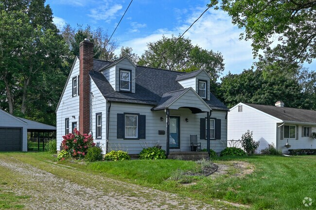 This Cape Cod-style home sits on a wide, picturesque street in the neighborhood of Burke Acres.